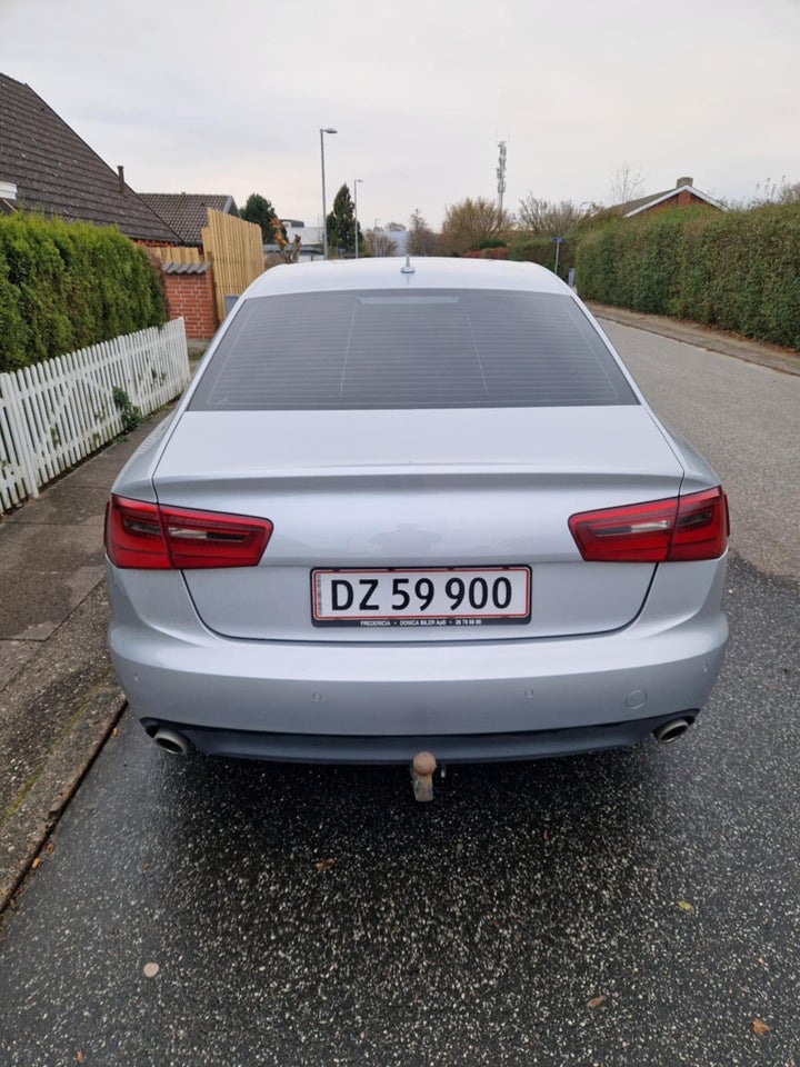 Audi A6 3,0 TDi 245 quattro S-tr. 4d