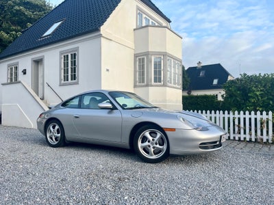 Porsche 911 Carrera 3,4 Coupé Tiptr. Benzin aut. Automatgear modelår 2001 km 76000 Sølvmetal ABS air