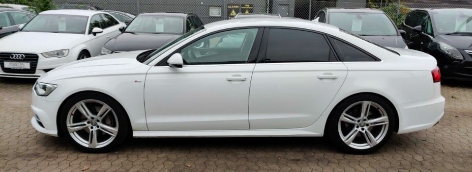 Audi A6 3,0 TDi 218 S-tr. 4d