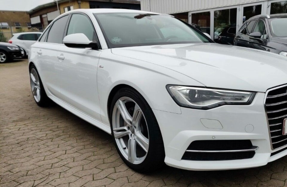 Audi A6 3,0 TDi 218 S-tr. 4d