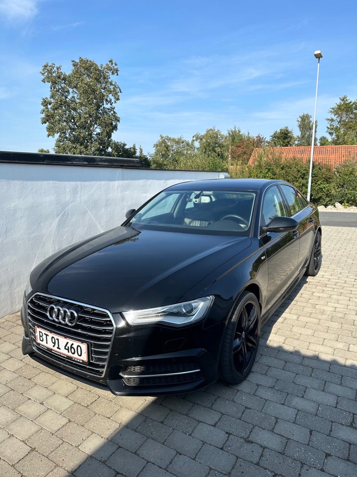 Audi A6 3,0 TDi 218 S-line S-tr. 4d