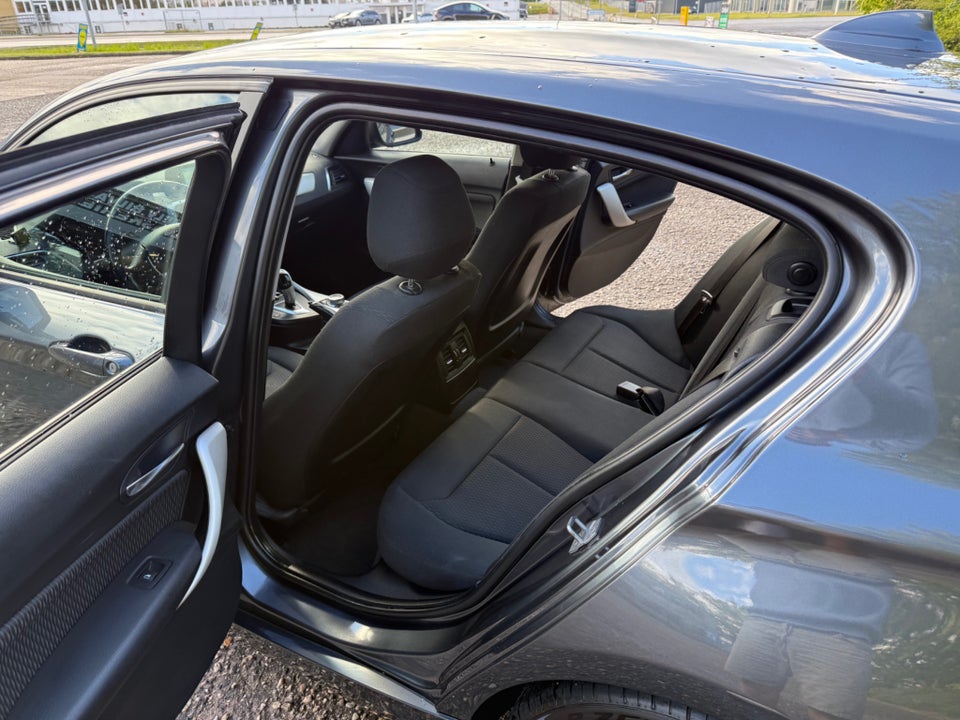 BMW 118i 1,5 Advantage aut. 5d