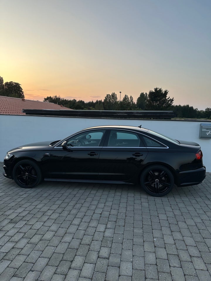 Audi A6 3,0 TDi 218 S-line S-tr. 4d