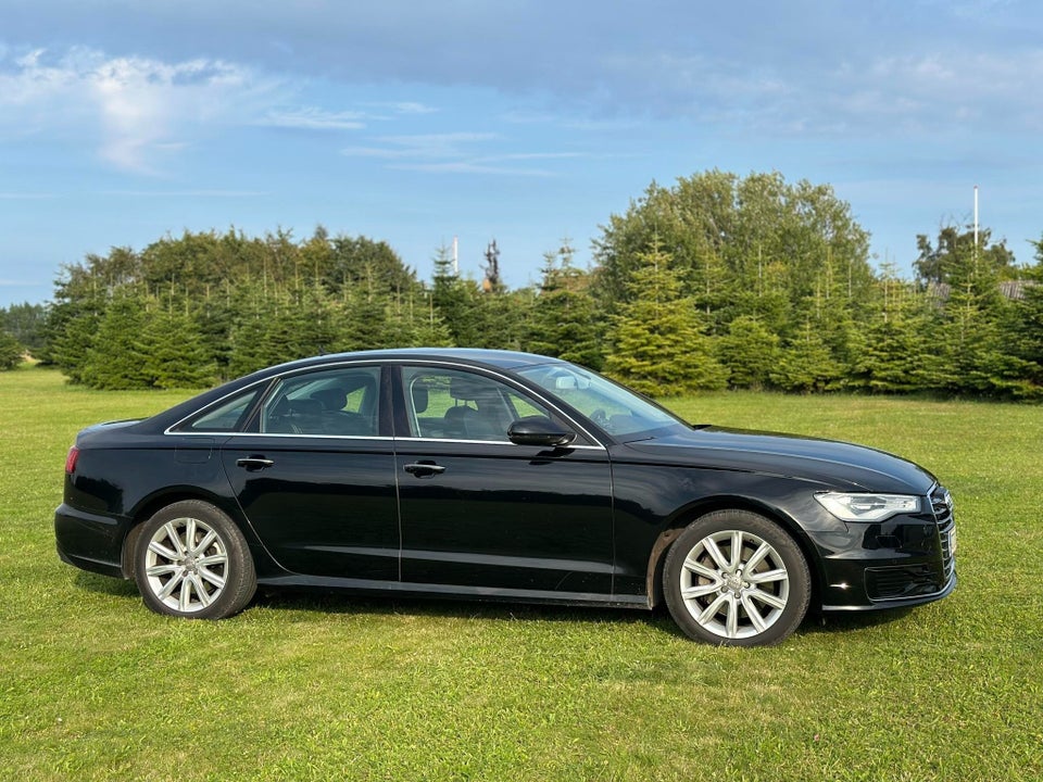 Audi A6 3,0 TDi 218 S-line S-tr. 4d