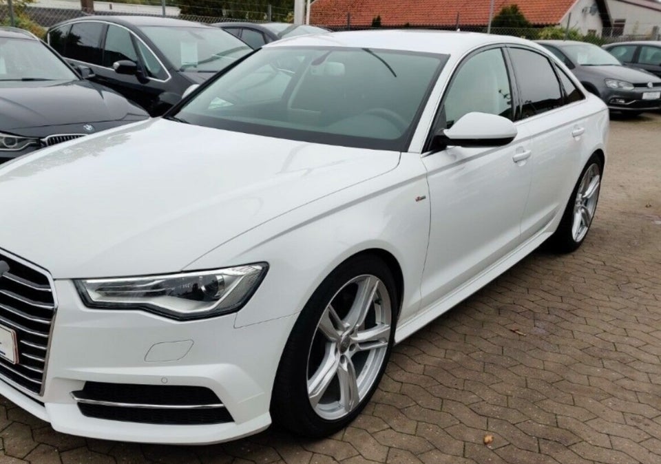 Audi A6 3,0 TDi 218 S-tr. 4d