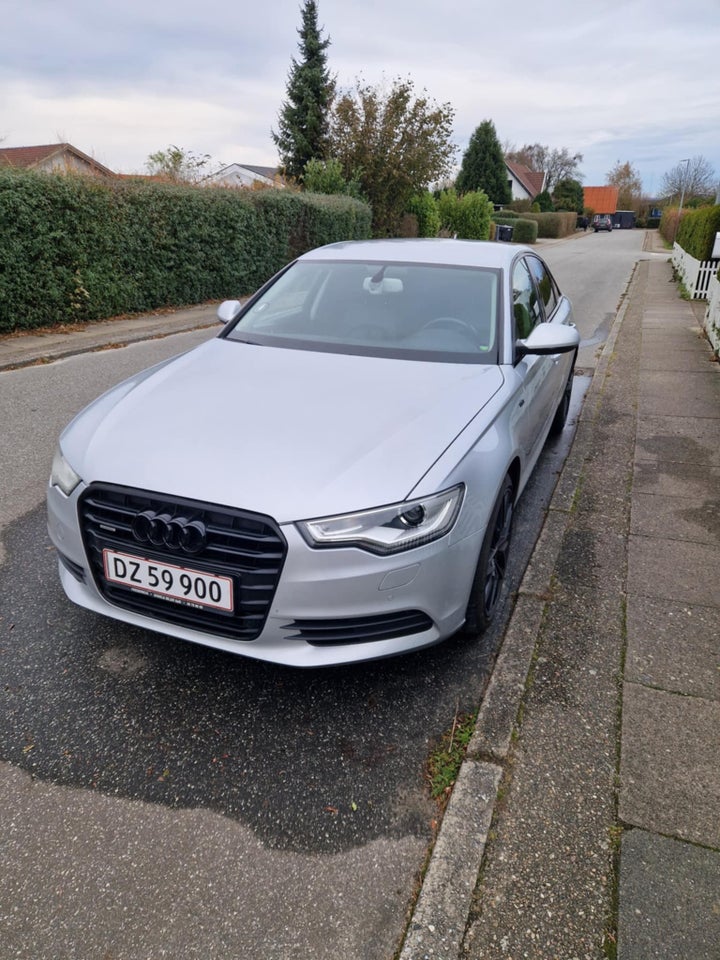 Audi A6 3,0 TDi 245 quattro S-tr. 4d