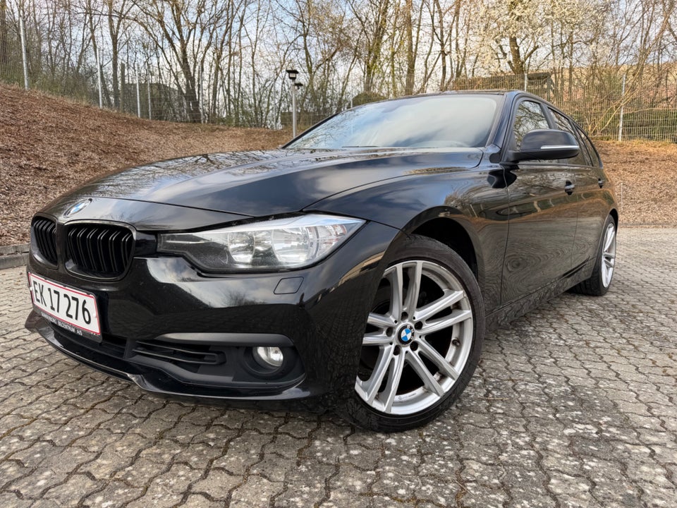 BMW 320i 2,0 Touring aut. 5d