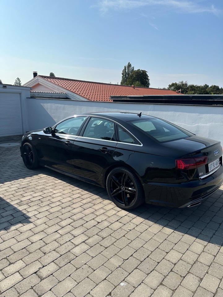 Audi A6 3,0 TDi 218 S-line S-tr. 4d