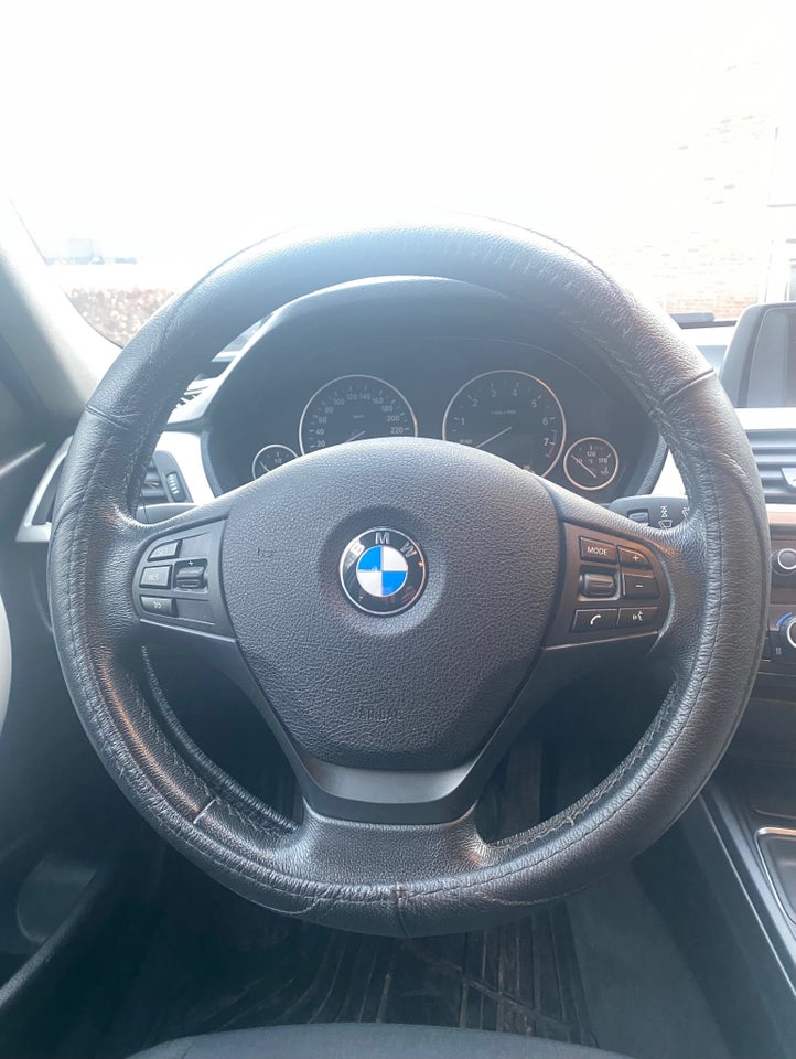 BMW 320i 2,0 aut. 4d