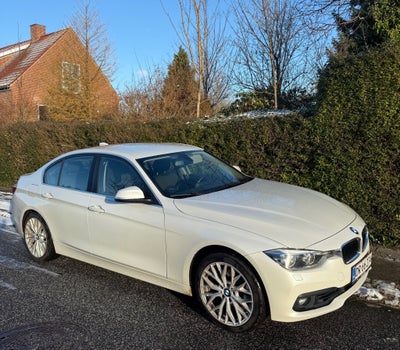 BMW 320i 2,0 Advantage aut. 4d