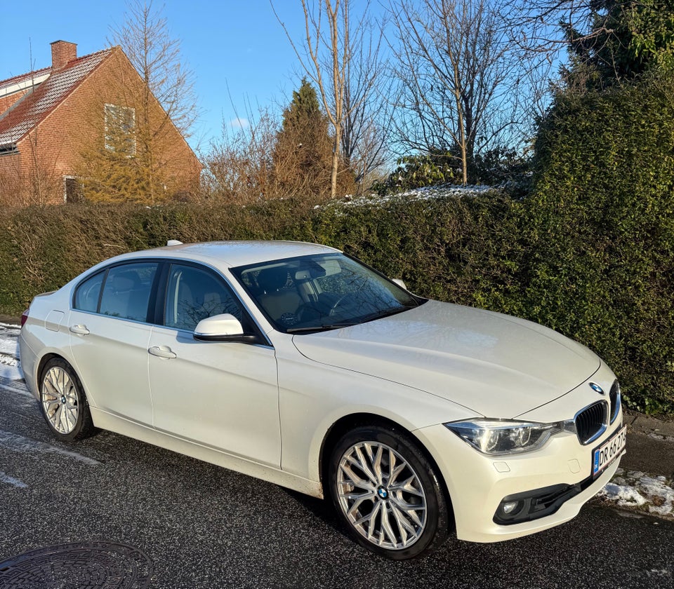 BMW 320i 2,0 Advantage aut. 4d