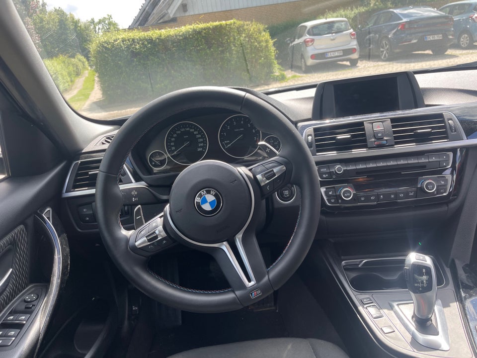 BMW 320i 2,0 aut. 4d