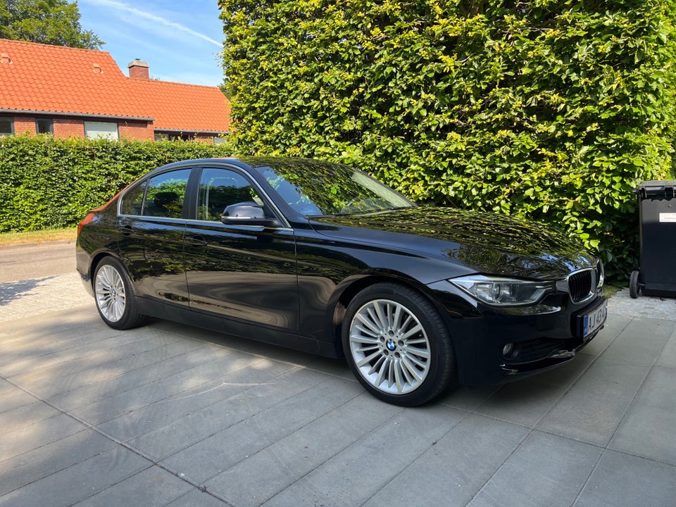 BMW 320i 2,0 aut. 4d