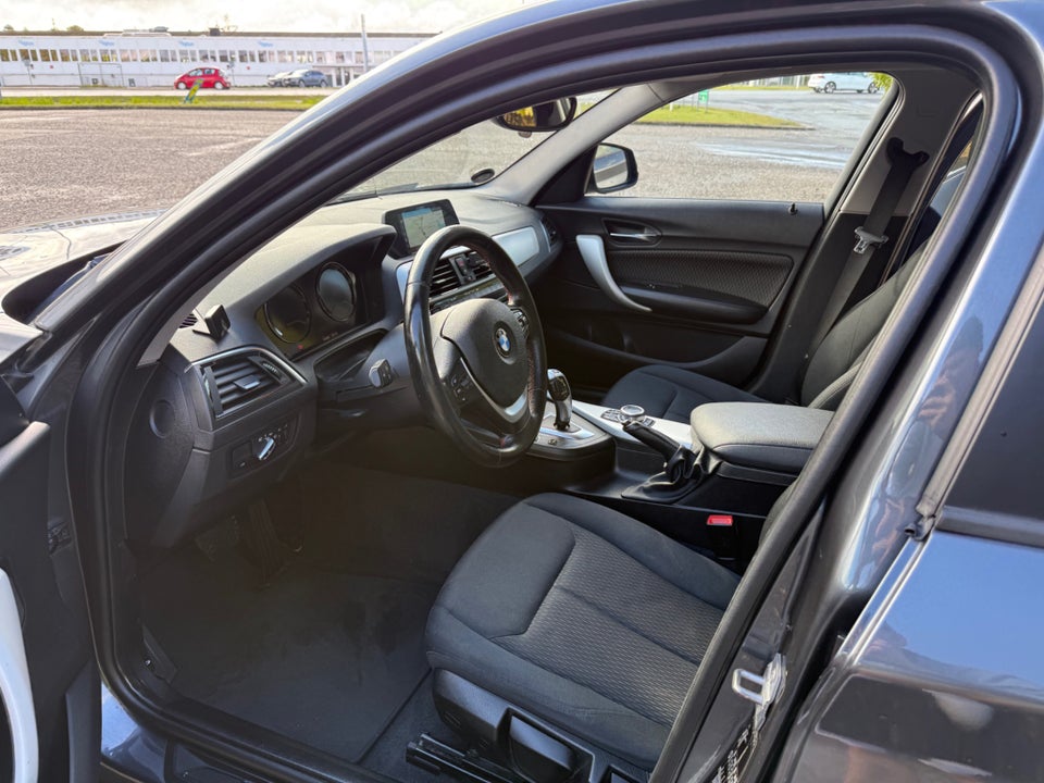 BMW 118i 1,5 Advantage aut. 5d