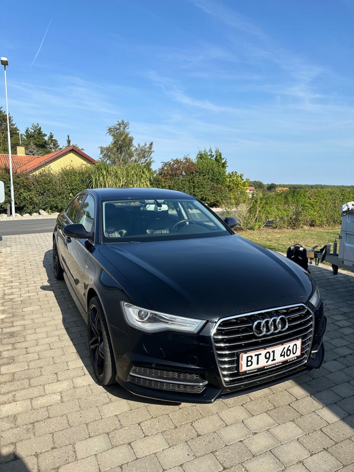 Audi A6 3,0 TDi 218 S-line S-tr. 4d