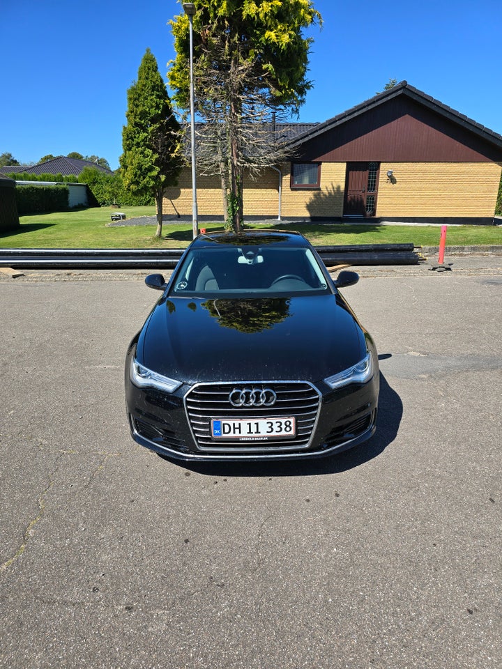 Audi A6 3,0 TDi 218 S-line S-tr. 4d