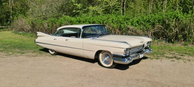 Cadillac Coupé DeVille 6,4 aut. 4d