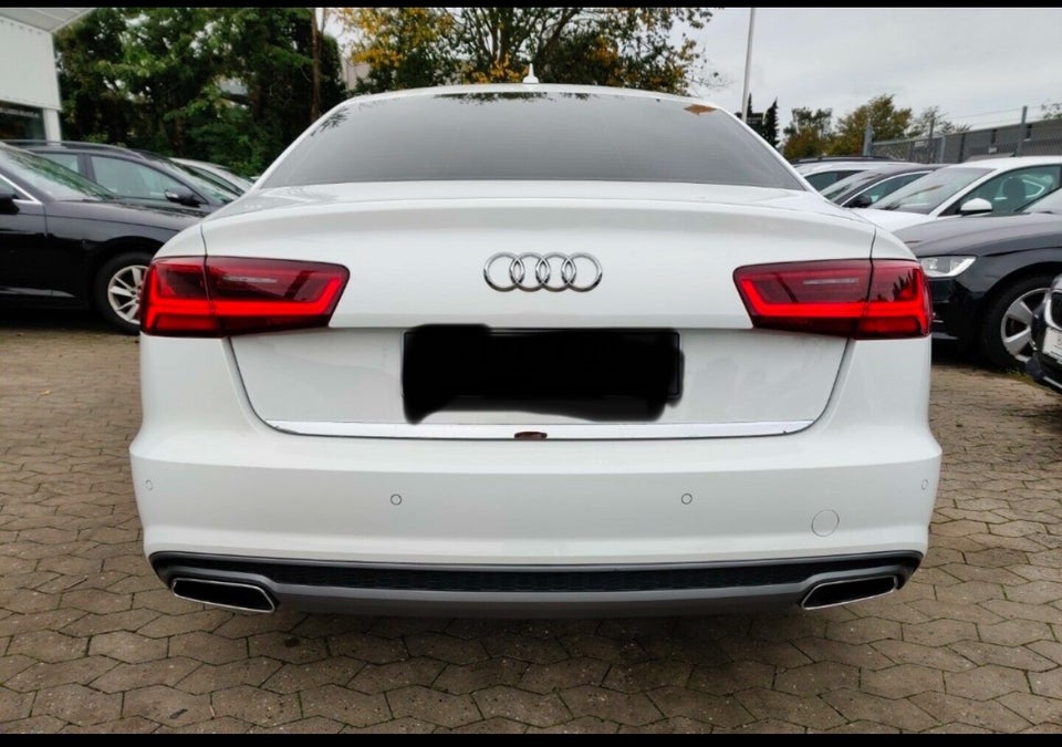 Audi A6 3,0 TDi 218 S-tr. 4d