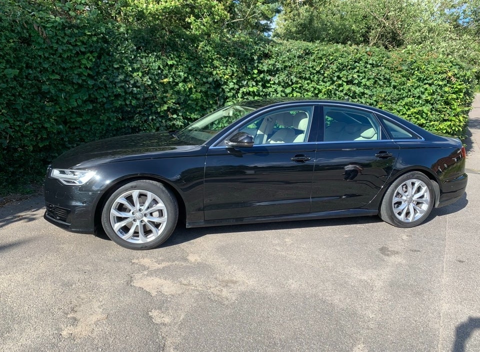 Audi A6 3,0 TDi 218 S-line quattro S-tr. 4d