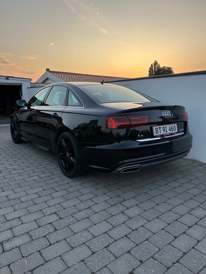 Audi A6 3,0 TDi 218 S-line S-tr. 4d