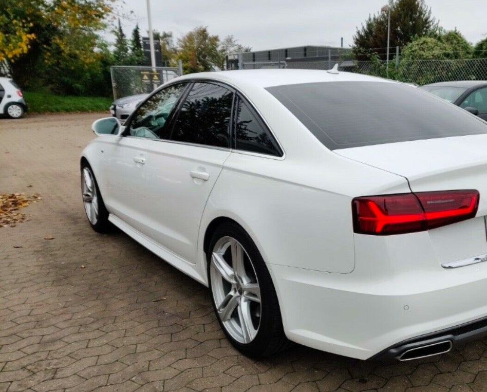 Audi A6 3,0 TDi 218 S-tr. 4d