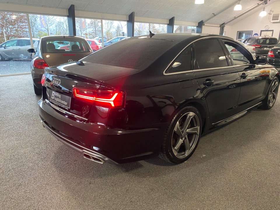 Audi A6 3,0 TDi 218 S-tr. 4d