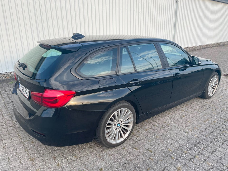 BMW 320i 2,0 Touring aut. 5d