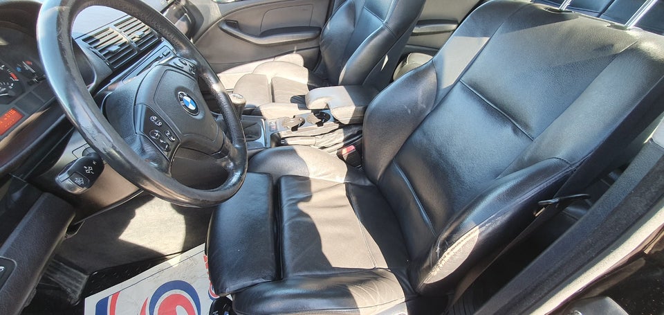 BMW 320i 2,2  4d