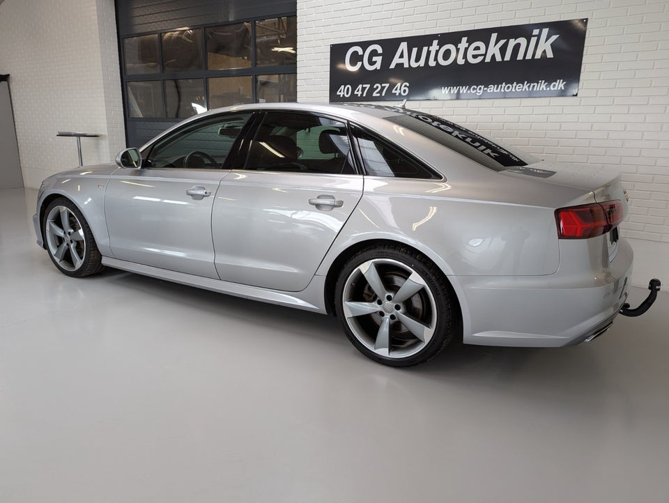 Audi A6 3,0 TDi 218 quattro S-tr. 4d