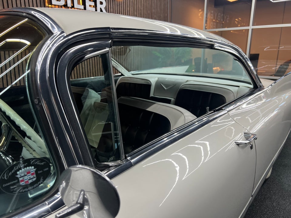 Cadillac Coupé DeVille 6,4 aut. 2d