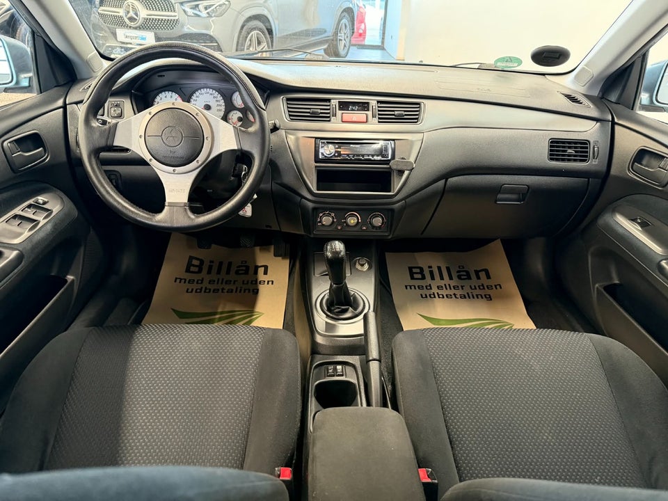 Mitsubishi Lancer 1,6 Comfort stc. 5d