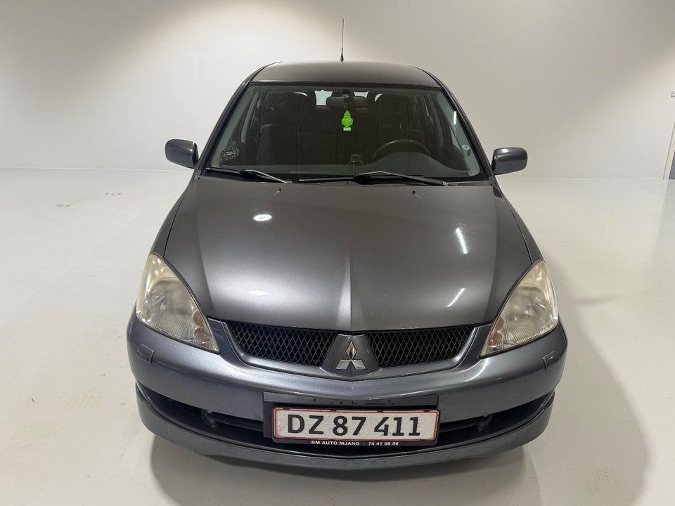 Mitsubishi Lancer 1,6 Invite stc. 5d