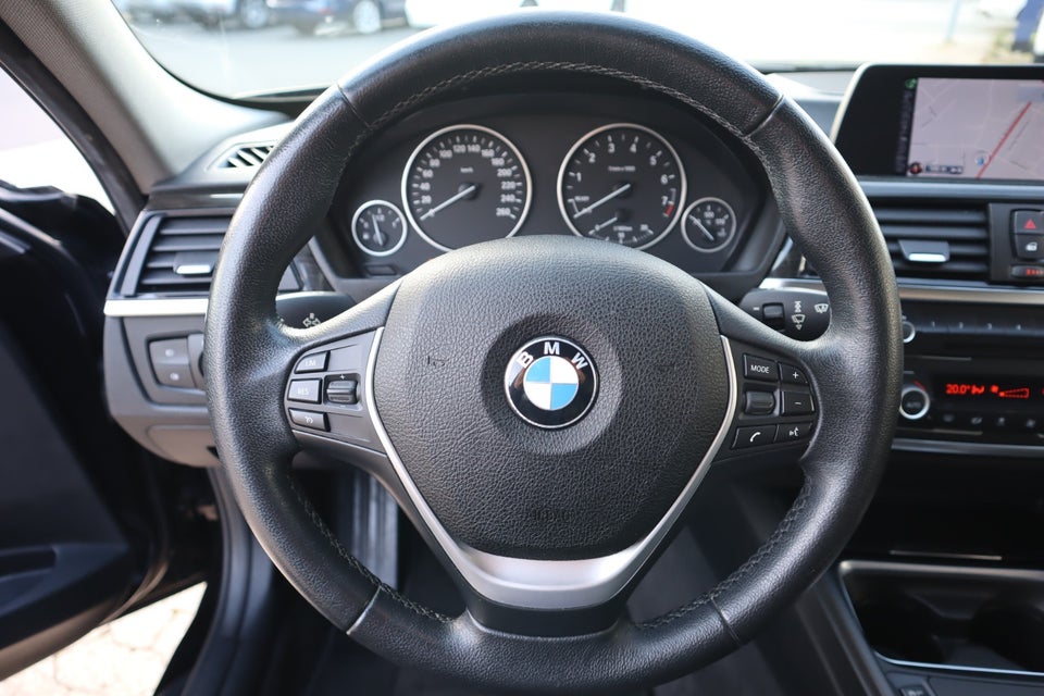 BMW 320i 2,0 aut. 4d