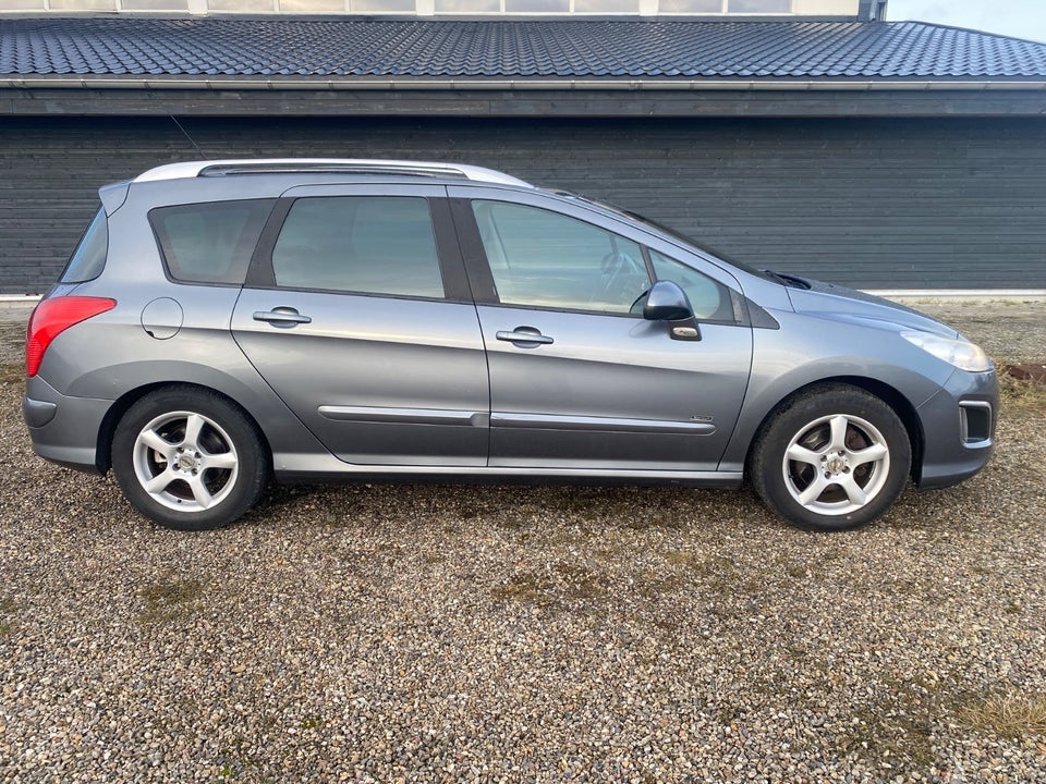 Peugeot 308 1,6 e-HDi 112 Sportium SW 5d