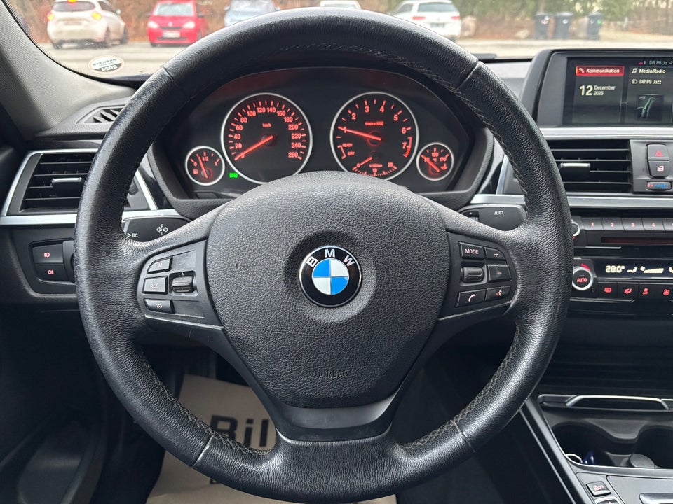 BMW 320i 2,0 aut. 4d
