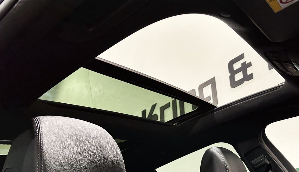 Mercedes E300 e 2,0 AMG Line stc. aut. 5d