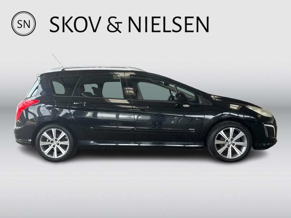 Peugeot 308 1,6 e-HDi 112 Sportium SW 5d