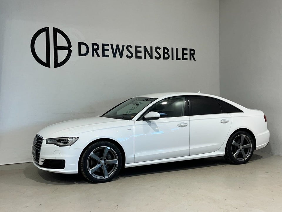 Audi A6 3,0 TDi 218 S-tr. 4d