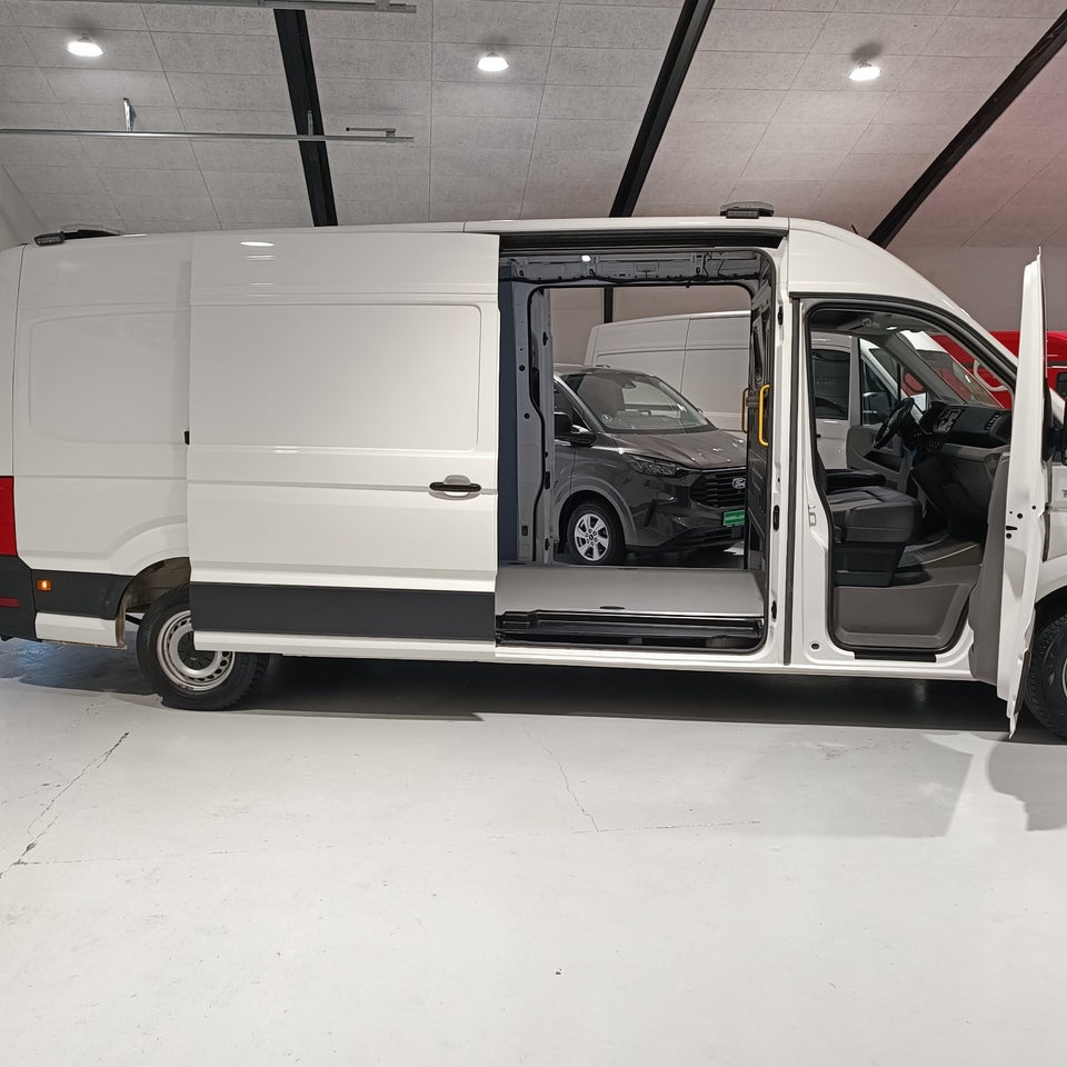 MAN TGE 2,0 3.180 Kassevogn L4H3 aut. FWD