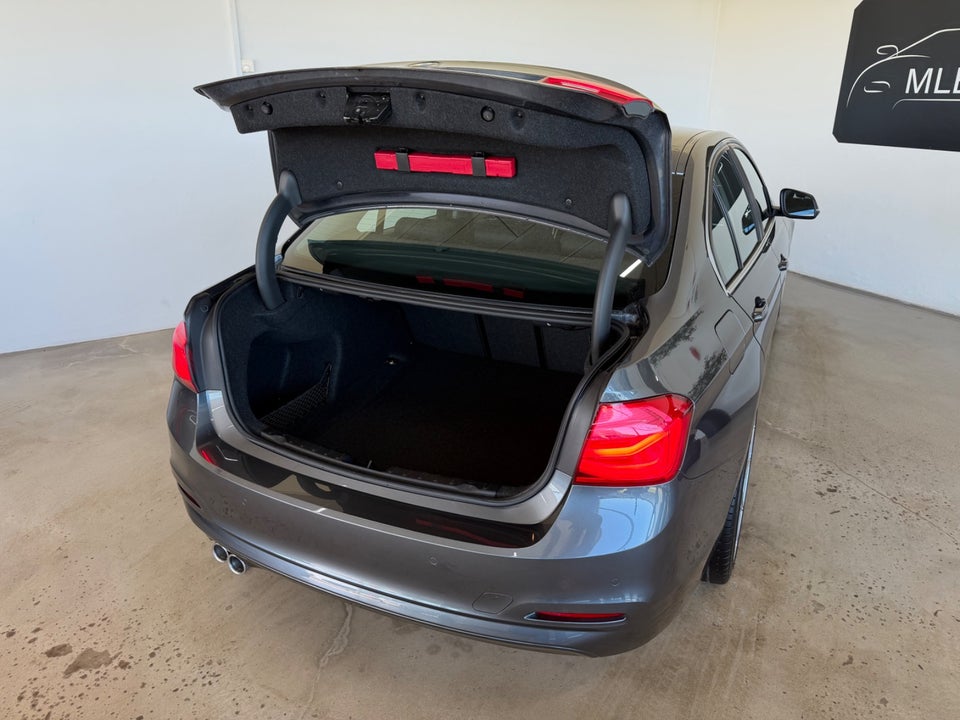 BMW 320i 2,0 Advantage aut. 4d