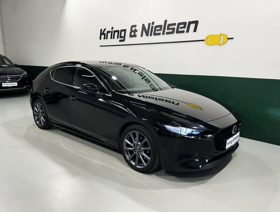 Mazda 3 2,0 SkyActiv-X 180 Cosmo Tech aut. AWD 5d