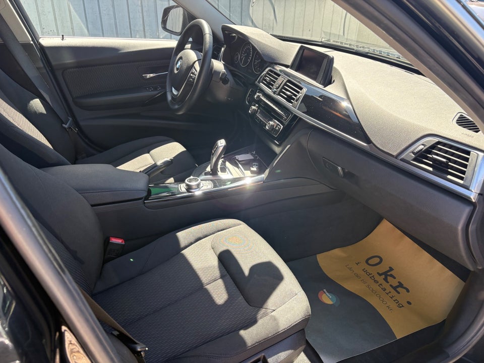 BMW 320i 2,0 Touring aut. 5d
