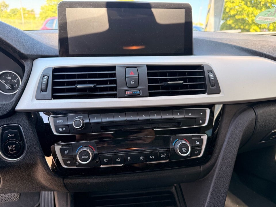 BMW 320i 2,0 Touring aut. 5d