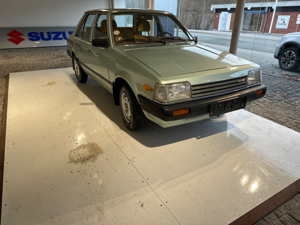 Mazda 323 1,3 LX 4d