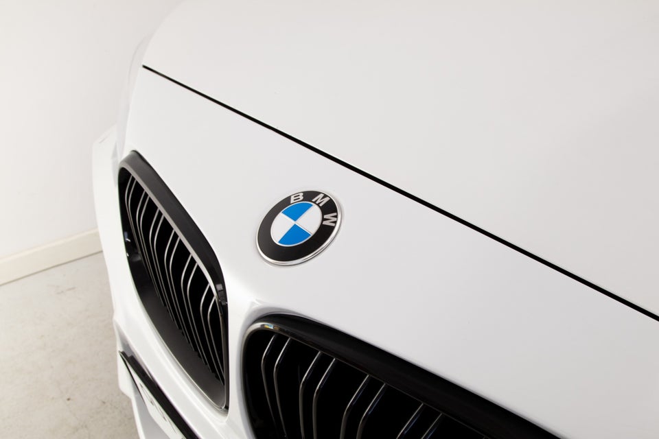 BMW 118i 1,5 Advantage aut. 5d