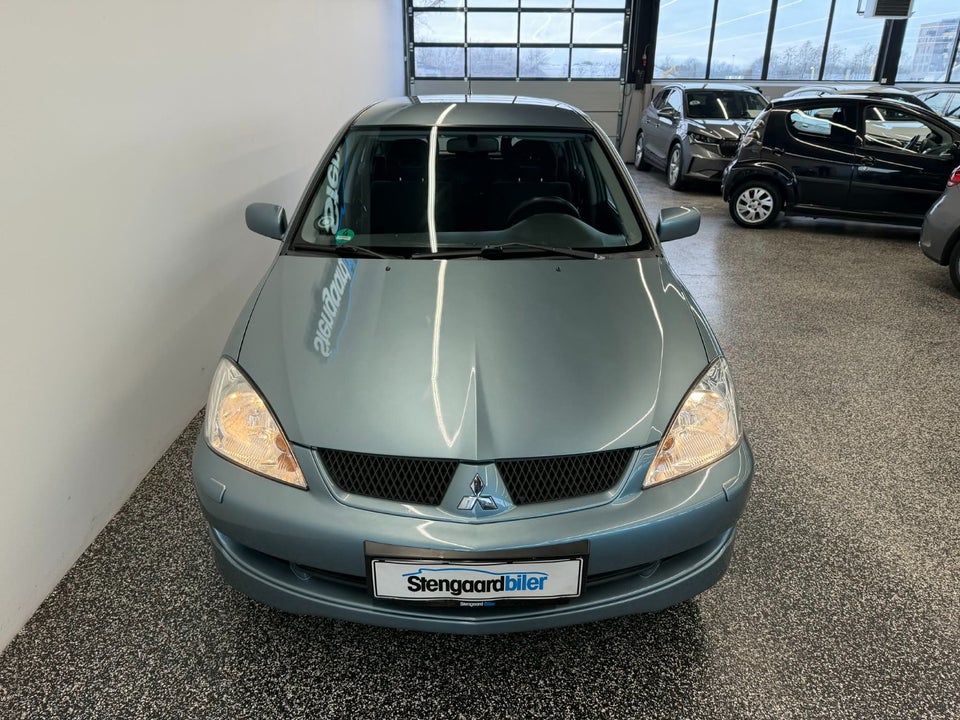 Mitsubishi Lancer 1,6 Comfort stc. 5d