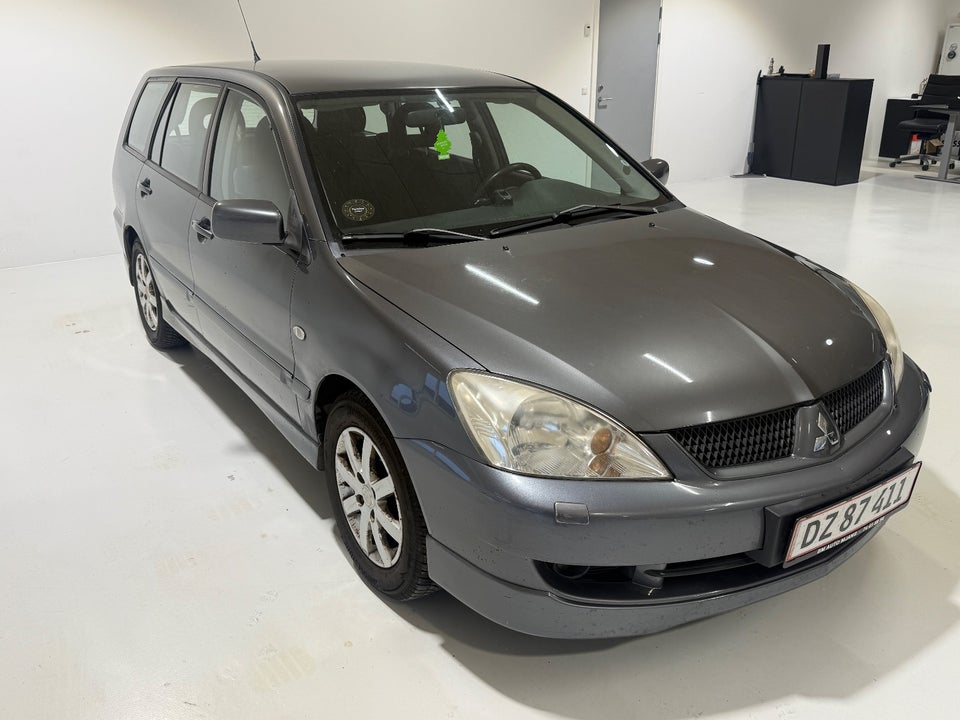 Mitsubishi Lancer 1,6 Invite stc. 5d