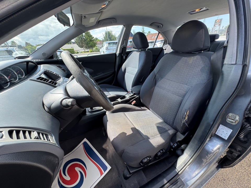 Nissan Primera 1,8 Visia aut. 4d