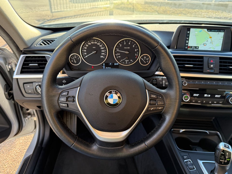 BMW 320i 2,0 Touring Advantage aut. 5d