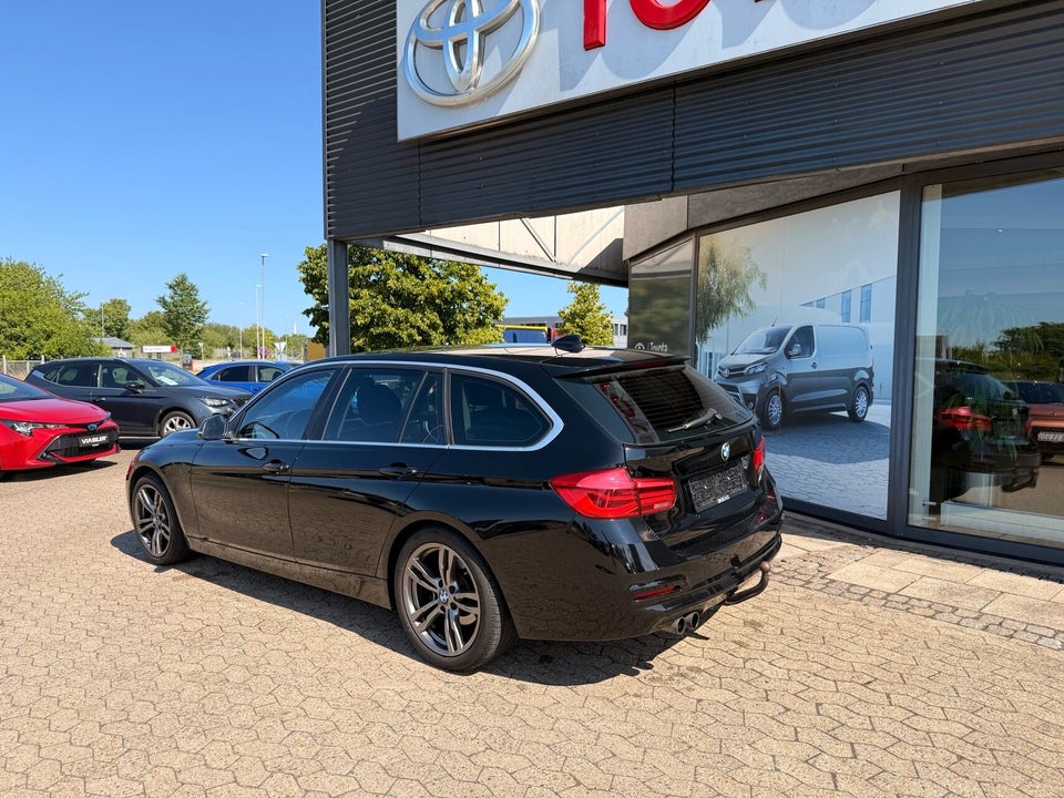 BMW 320i 2,0 Touring aut. 5d